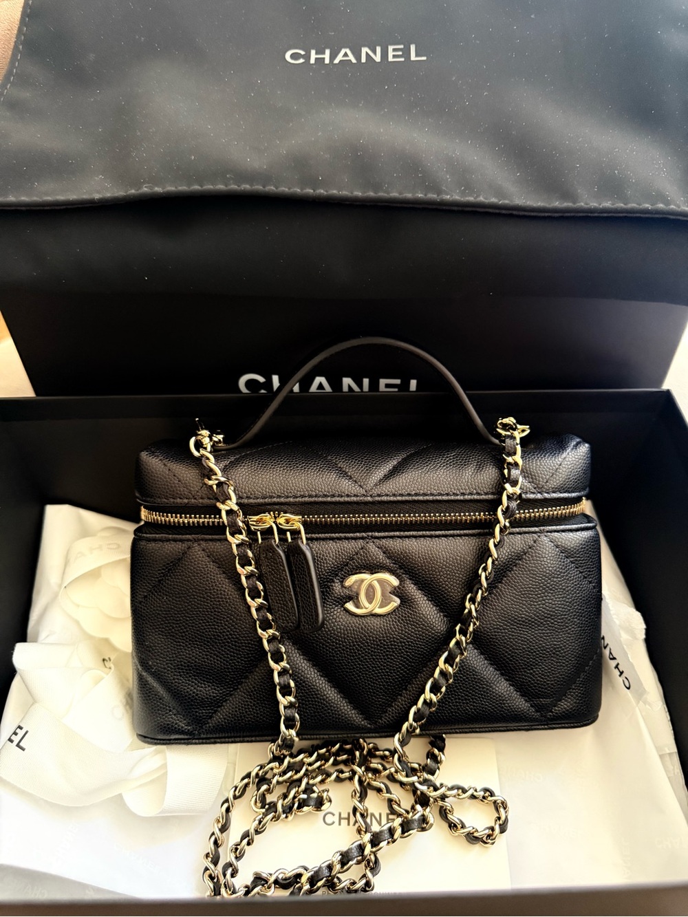 CHANEL Slim Vanity Top Handle With removable gold strap.